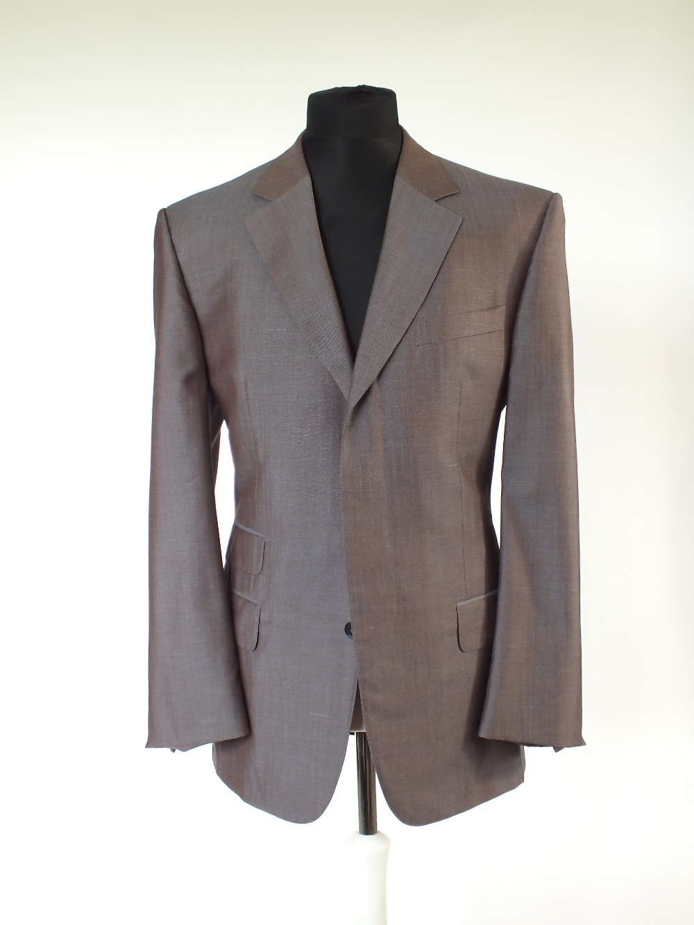 A Gucci suit, mauve, single vent, contrast burgundy lining, Italian size 50R, 54% wool, 46% silk,