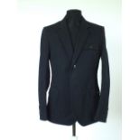 A Gucci jacket, navy, top stitching detail to pockets, embroidered motif to breast pocket, buttons