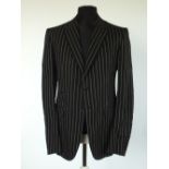 A Gucci jacket, black with white pinstripe, single vent, lined, Italian size 52L, 100% cotton