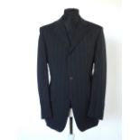 A Gucci suit navy blue pinstripe, double vent, Italian size 50R, 97% wool, 3% elastine, flat front