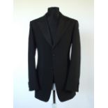 A Prada dinner suit, black, lower lapel in satin twill, Italian size 50L, 60% mohair, 40% wool,