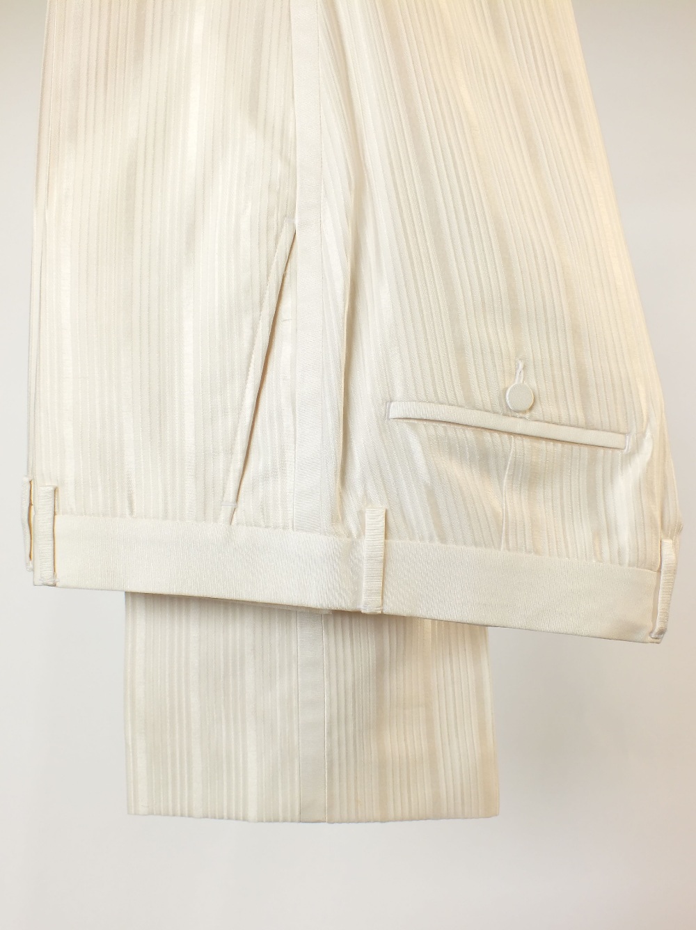 A Gucci dinner suit, cream, self strip with twill lower lapel, single vent, Gucci G embroidered to - Image 6 of 7