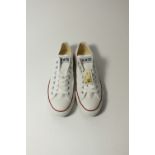A pair of Converse All Stars, white canvas, red and blue trim, UK 9