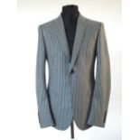 A Gucci three piece suit, grey pinstripe, double vent, Italian size 52R, 100% wool, flat front to