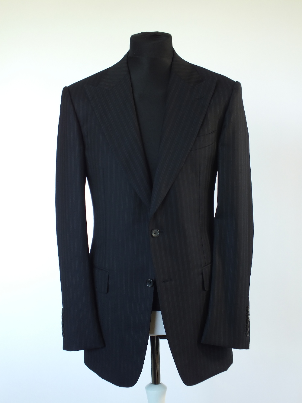 A Gucci suit, navy with self stripe, double vent, Italian size 50L, 100% wool, flat front