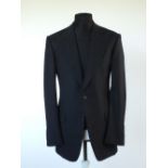 A Gucci suit, navy with self stripe, double vent, Italian size 50L, 100% wool, flat front