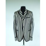 A Gucci jacket, navy blue and ivory stripe with black grosgrain edging detail and patch pockets,