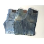 Three pairs of jeans, blue, include Versace, Gucci, Dolce and Gabbana, Italian size 54