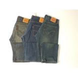 Three pairs of jeans, blue, Levi 501, two pairs, one 505, 34/34