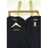 Three Gucci t-shirts, black, one with red and green signature detail, one with grey/black