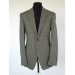 A Gucci sports jacket, mid grey checked, double vented, lined, Italian size 50R, 90% wool, 10%