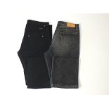 Two pairs of Gucci jeans, one black, one dark blue with black wash detail, Italian size 52