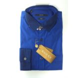 A Gucci shirt, blue with black and blue check detail to collar and cuffs, with tags, skinny fit.