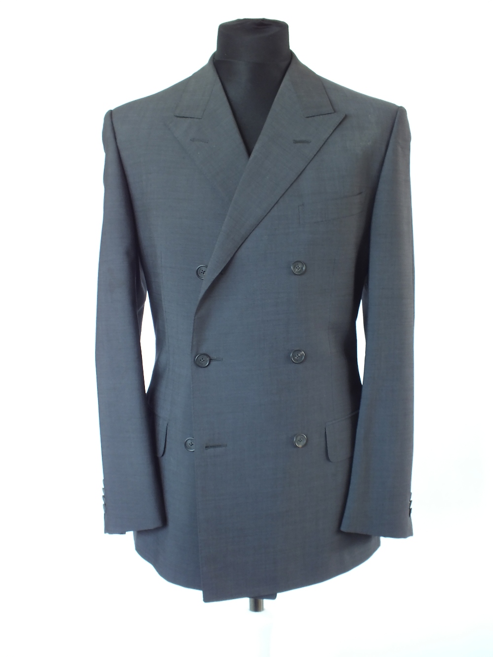 A Gucci suit, grey, double vent, Italian size 50R, 75% wool, 25% mohair, damage to left shoulder,