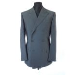 A Gucci suit, grey, double vent, Italian size 50R, 75% wool, 25% mohair, damage to left shoulder,