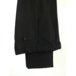 A pair of Prada trousers, black, flat front, 96% wool 4% other fibres, Italian size 48