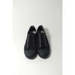 A pair of Lacoste plimsolls, black canvas, UK 9