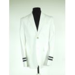 A Gucci jacket, white, single vent, navy stipe edging detail to cuff, Gucci anchor embossed buttons,