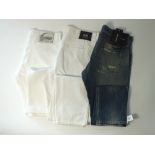 Three pairs of jeans, two white, one blue, to include Just Cavalli, Versace, Dolce and Gabbana,