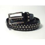 A Prada black leather studded belt with silver buckle, size 38