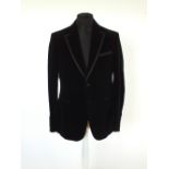 A Gucci dinner jacket, black, velvet, satin edging, lined, Italian size 52R, 78% cotton, 24% silk,