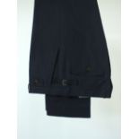 A pair of Gucci trousers, navy, flat front, external pocket flaps to back pockets with contrast