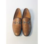 A pair of Gucci tan slippers with silver horse bit, UK 8.5, leather, signs of wear