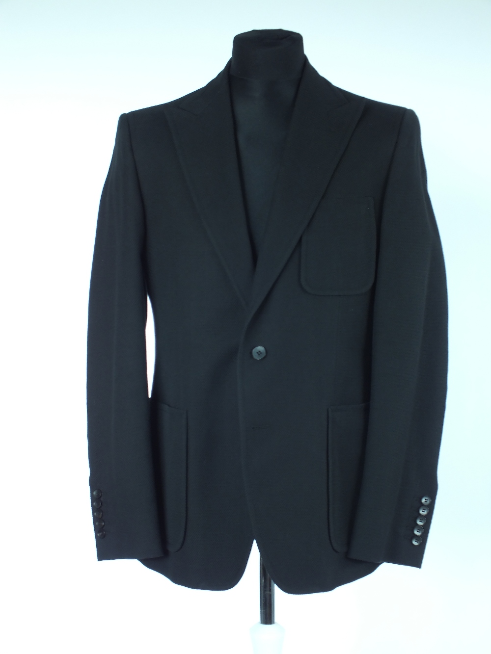 A Gucci jacket, black, patch pockets, single vented, Italian size 52R, 100% cotton