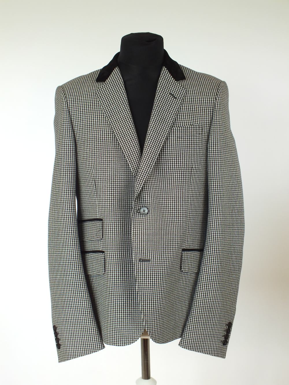 A Gucci jacket, black and white check, black suede upper lapel, black suede design details, double