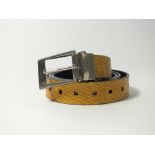 An Oliver Sweeney light tan snakeskin effect belt with silver buckle