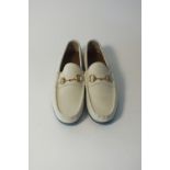 A pair of Gucci loafers, cream, suede, brass horse bit, UK 8.5, blue sole