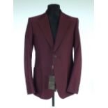 A Gucci jacket, brand new with Gucci swing ticket, burgundy, patch pockets, single vent, top