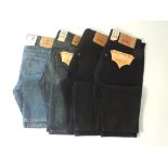 One pair of Levi 506 jeans, blue, one pair of Levi 501, blue, two pairs of 501 black, two with tags,