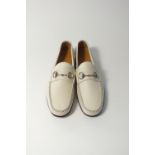 A pair of Gucci loafers, white leather, silver pewter horse bit detail, UK 8.5