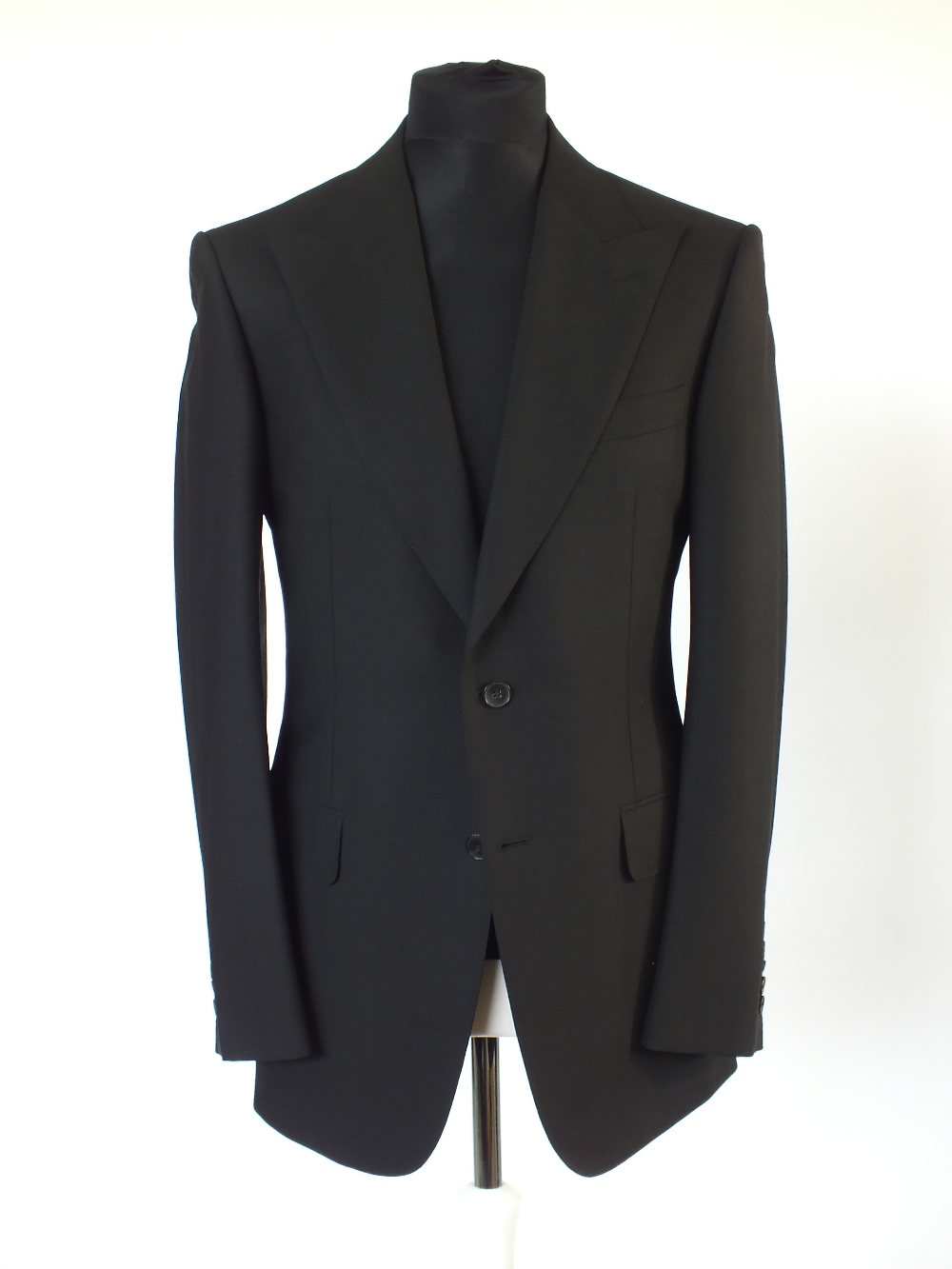 A Gucci suit, black, double vent, Italian size 50R, 75% wool, 25% mohair. Flat front, button fly