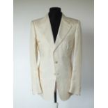 A Gucci jacket, cream, lined, single vent, patch pockets with pleating detailing, front and back