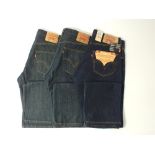 Three Levi 501 jeans, two blue, one dark blue, one with tags, 34/34