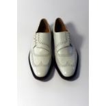A pair of Gucci brogues, white leather, side lace, brown soles, size EU 42E