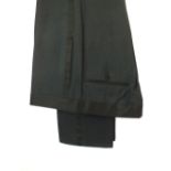 A pair of Gucci trousers, dark grey, black satin detailing, flat front 100% silk, Italian size