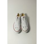 A pair of Converse All Stars, white canvas, red and blue trim, UK 9