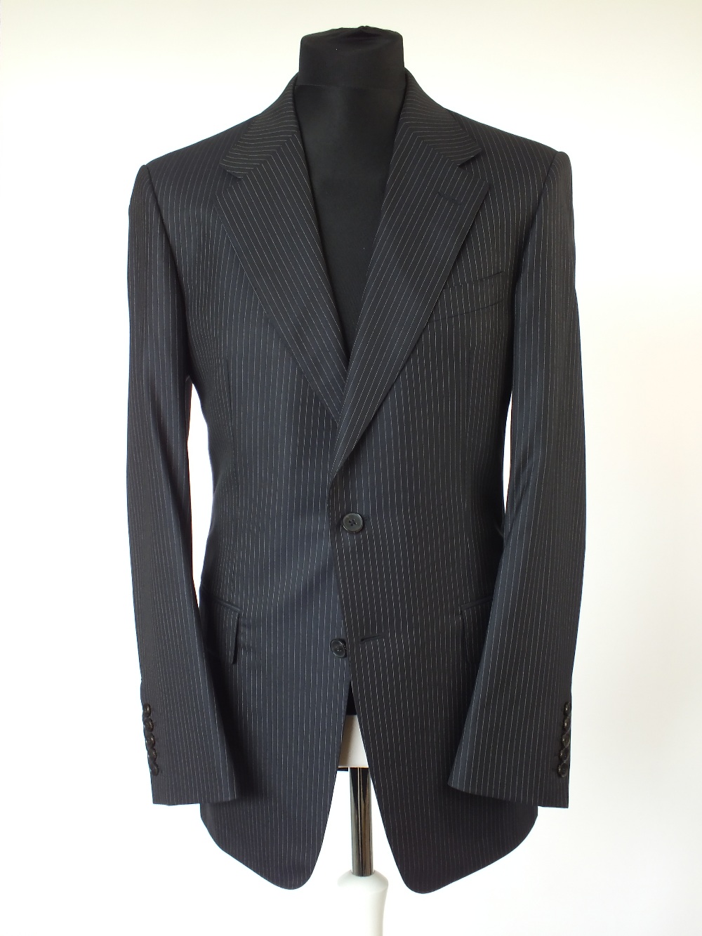 A Gucci suit, navy pinstripe, double vent, Italian size 50L, 80% wool, 20% silk, single pleat