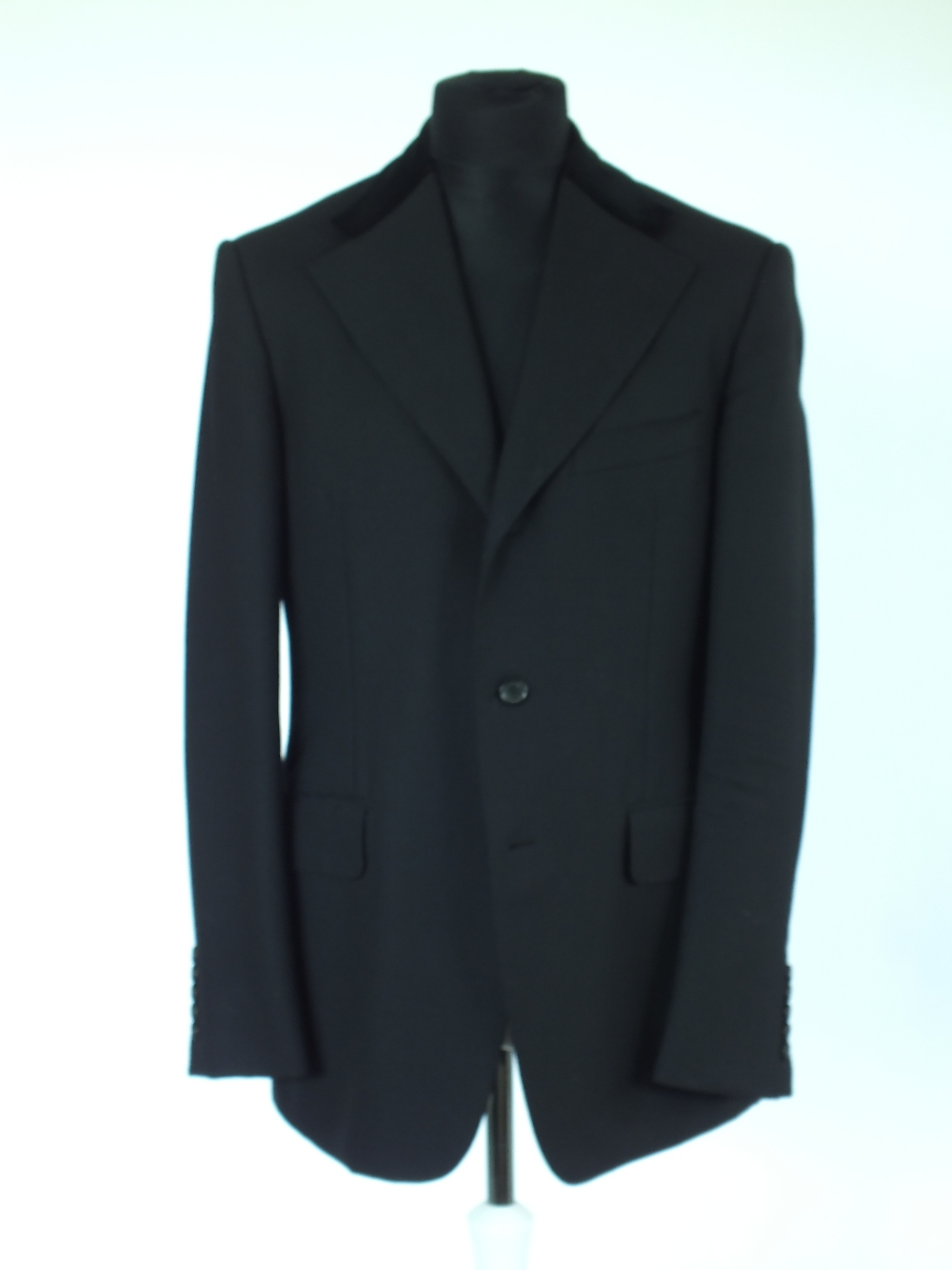 A Gucci dinner jacket, black, part velvet collar, double vented, lined, Italian size 50R, 100% wool
