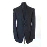 A Gucci suit, navy pinstripe, double vent, Italian size 50R, 100% wool, Trousers, button fly, flat