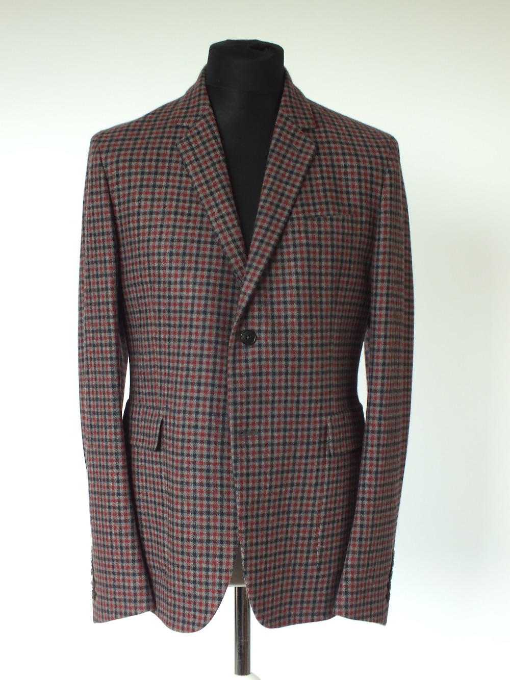 A Gucci jacket, red, grey and navy check, double vented, half lined, Italian size 52R, 100%