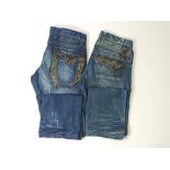 Two pairs of Cipo and Baxx blue denim jeans with leather and studding trim detail, size 34