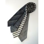 Four ties to include one stripy black and grey, one silver and black with a B logo, Jaeger black and