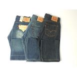 Three pairs of Levi 501 jeans, dark blue, one with tags, 34/34