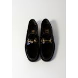 A pair of Gucci black velvet and patent shoe, loafer with brass horse bit detail, UK 8.5 evening