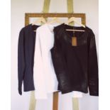 Three Gucci, long sleeve t-shirt, one black with plasticised detail, one white with Gucci logo to