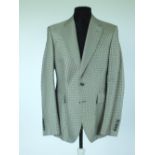 A Gucci sports jacket, mid grey dogs tooth check, patch breast pocket, single vent, half lined in